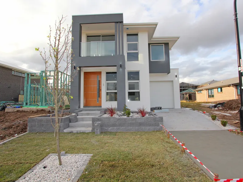 Immaculate Family Home with Downstairs 5th Bedroom & Bathroom