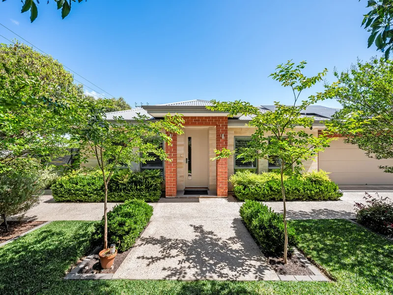 Immaculate 3-bedroom courtyard home with luxury finishes and Linear Park at the end of the street.