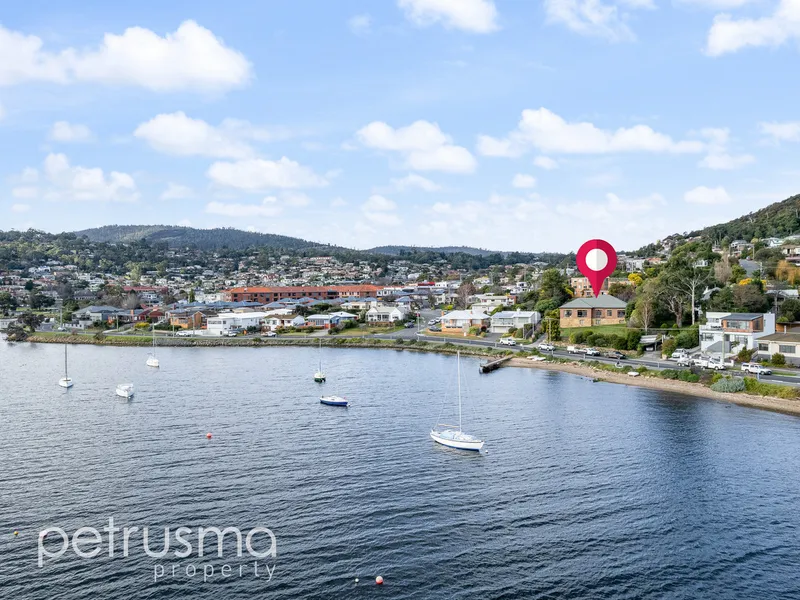 Beautiful large home in ideal waterfront location with jetty and mooring