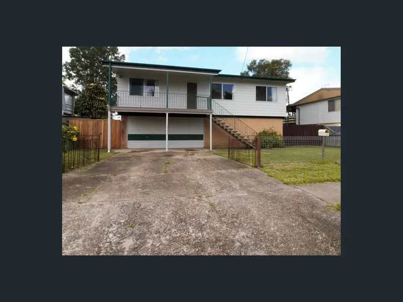 FAMILY HOME WITH YARD FOR THE KIDS!