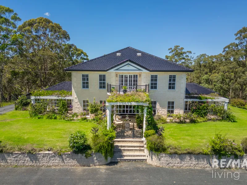 MAJESTIC HILLTOP HOMESTEAD ON 78 ACRES!