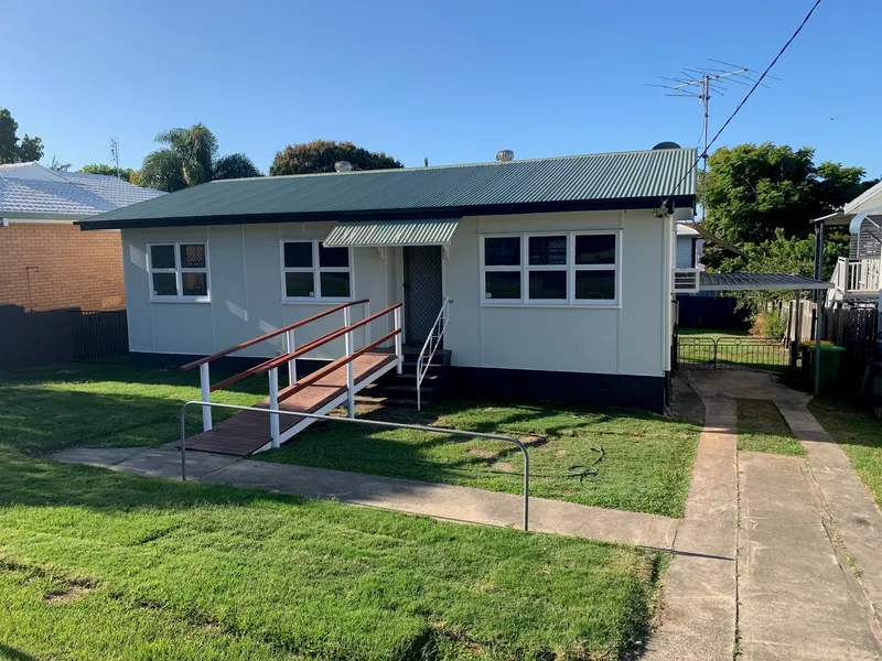 RENOVATED - Neat central Southport home - Mowing included