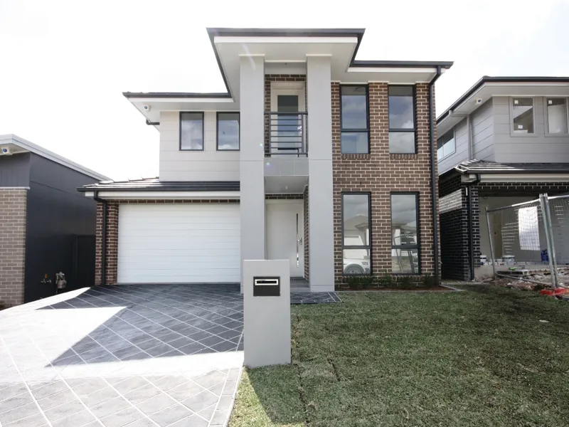 Brand new 4 bedroom home plus study