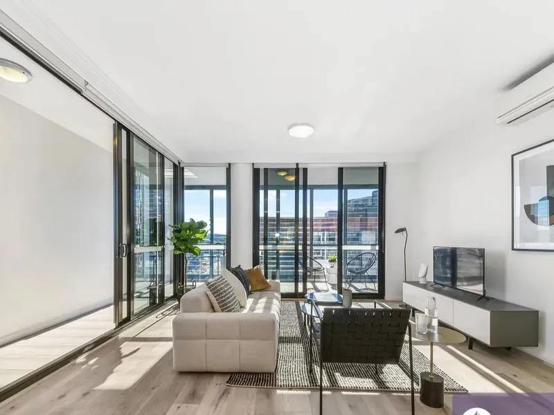 Luxurious Waterfront Living - Top Floor Gem with Stunning Views