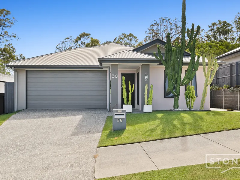Luxe, Low-Maintenance Living With A Pool & Beautiful Bushland Backdrop