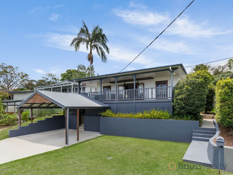 Gorgeous 1960’s home with massive poolside deck for effortless entertaining