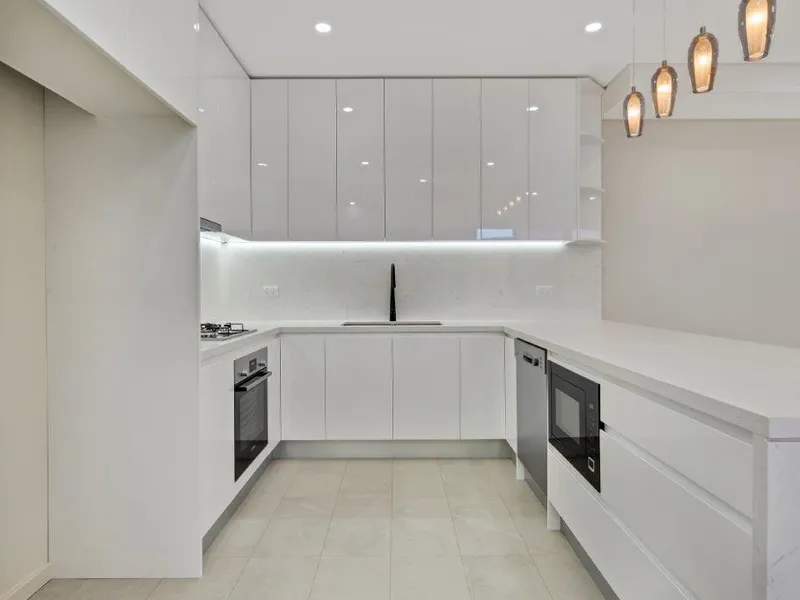 Exclusive Near New Townhome with Private Garden