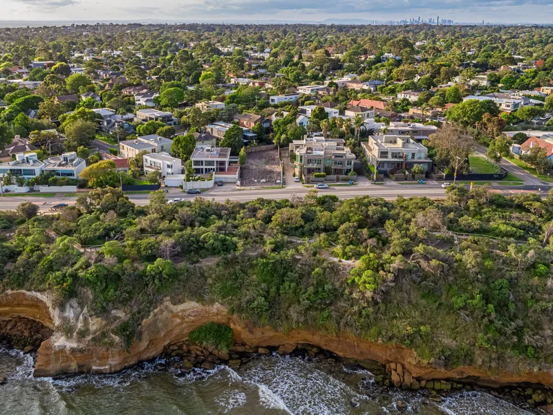 Rare Opportunity with Plans and Permits on Prestigious Beach Road