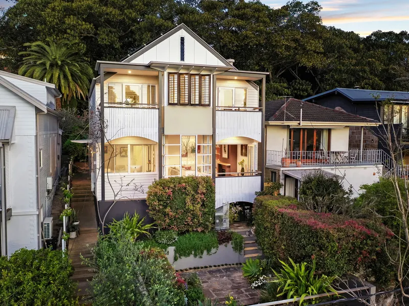 Impressive architect designed contemporary family home with a sought after north east rear aspect and an elevated outlook