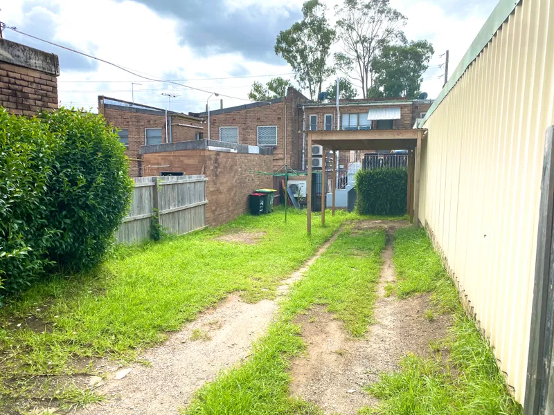 SPACIOUS TWO BEDROOM GARDEN UNIT WITH BALCONY