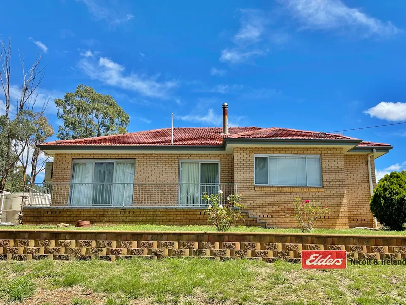 RENOVATED BRICK HOME WITH ACCESS TO ACRES