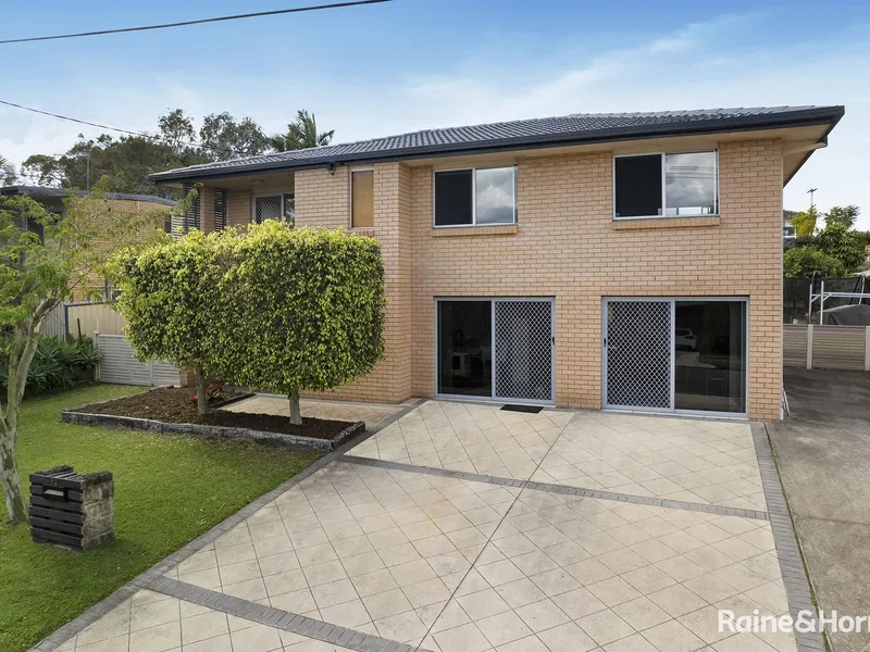 Captivating Two-Story Family Home with Versatile Business Space