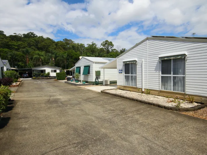 Spacious affordable two bedroom manufactured home in a pleasant rural setting, located close to the village amenities and community entrance.