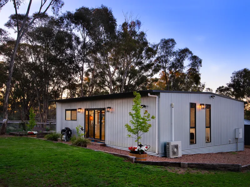 Bespoke modular home embracing a country atmosphere in the trees.