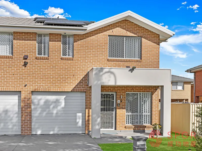 Stunning duplex style townhouse facing north