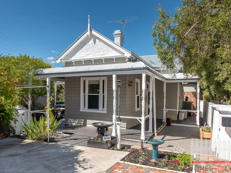 STUNNING CENTURY-OLD CORNER CHARACTER!