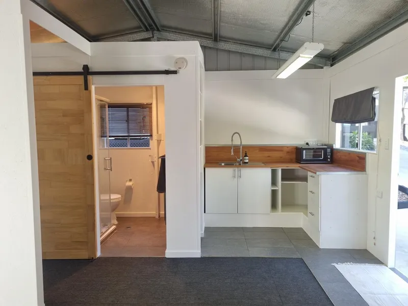Self Contained Studio w/ Private Yard, Driveway, Garage & Laundry/ Storage room