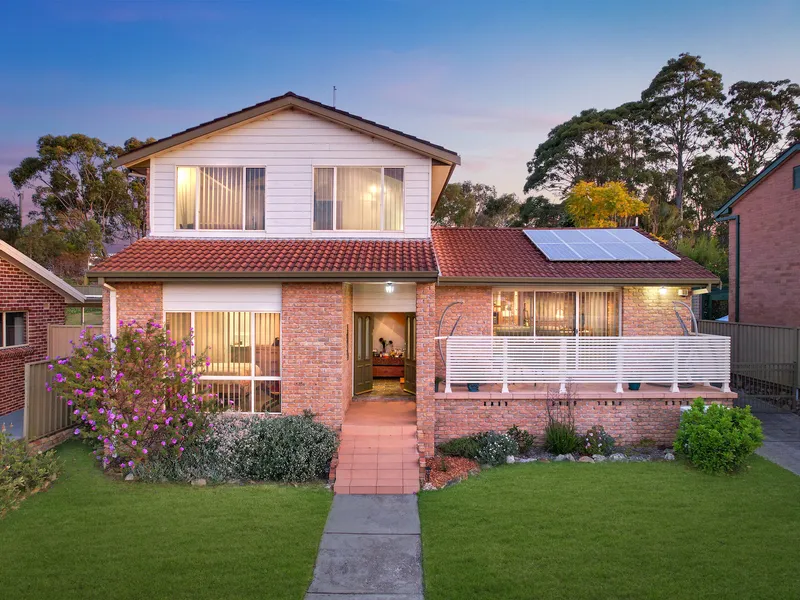 Character filled home with lake views and direct access to the Bay shopping village