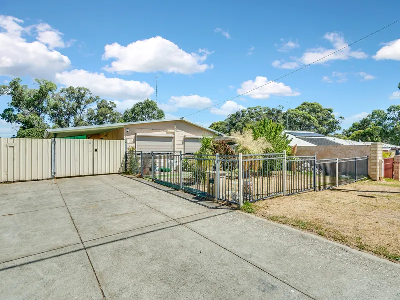 Powered workshop and plenty of parking space