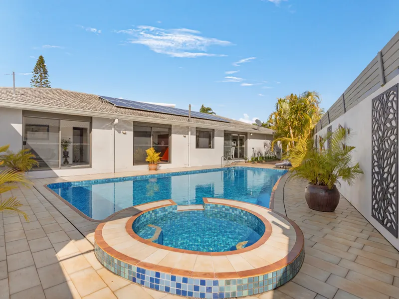 Luxurious Retreat with Pool and Serene Waterfront Deck