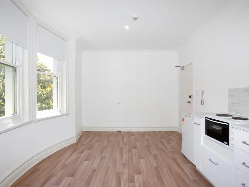 Updated sunny studio with new Kitchen, Flooring and Paint