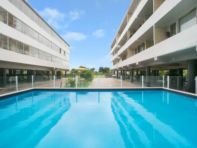 Rare 2 bedroom unit located right opposite the beach!