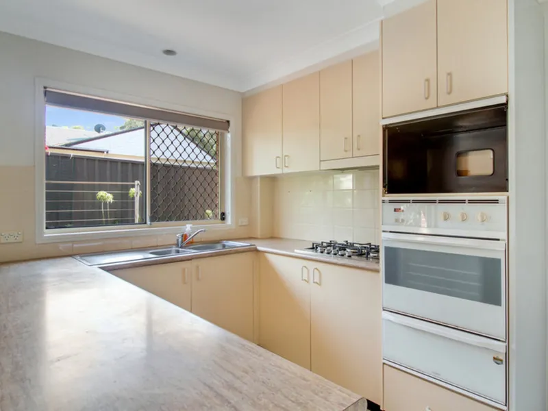 Lovely two bedroom town house is situated in a quiet cul-de-sac