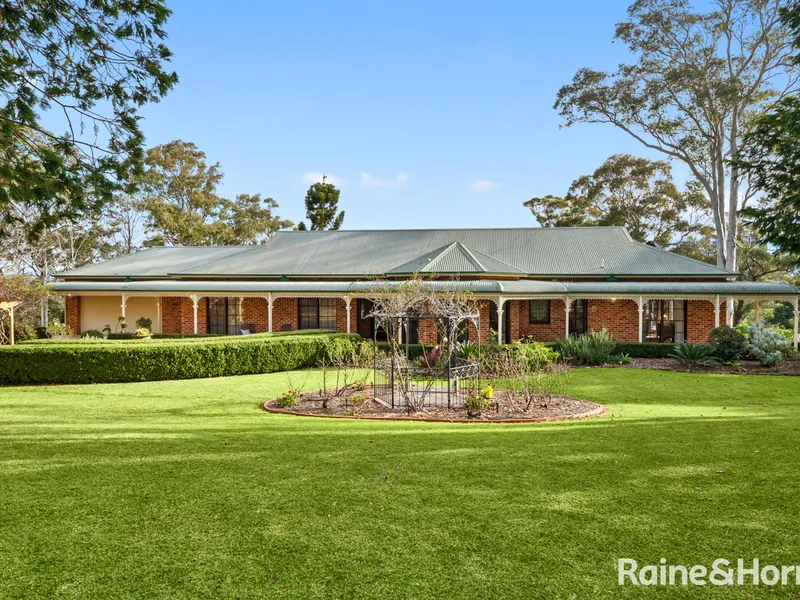 Pristine home on 15 elegant acres