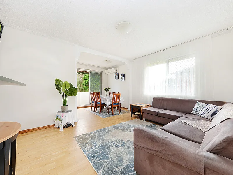 Take A Step Up to Peaceful Treetop Retreat in Central Location