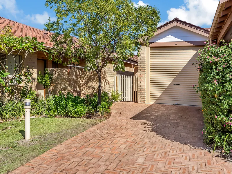 Tucked away with lovely outdoor areas back and front. Price Reduced!