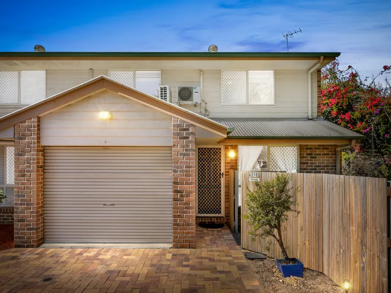 Hidden Gem – Immaculate Townhouse With Massive Wrap Around Courtyard!