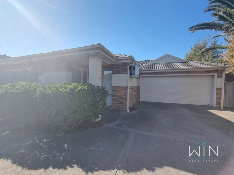 Charming Unit with Private Driveway in Prime Location