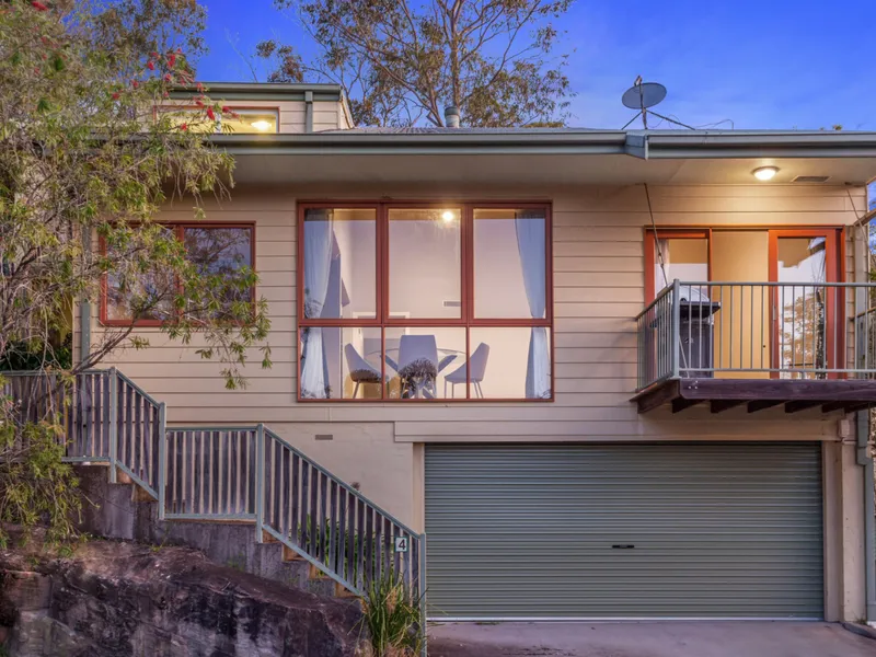 Low maintenance family living in a convenient walk-to-rail location