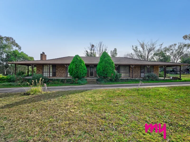 CHARACTER FILLED HOME WITH LAND