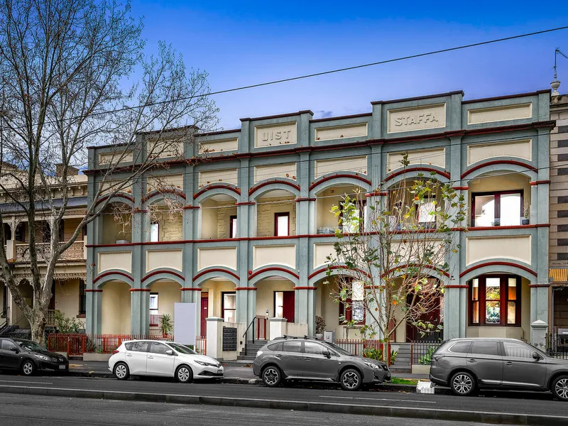 Opposite Carlton Gardens and walking distance to CBD