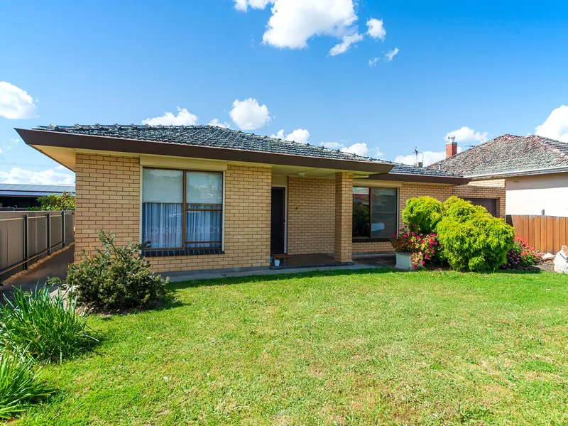 Location Perfect Brick Home!