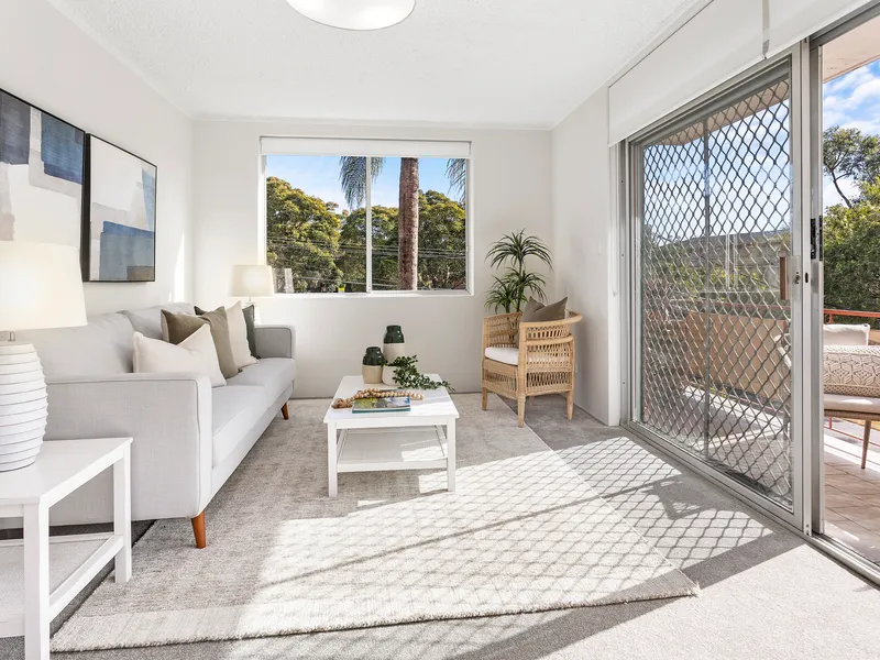 Sunlit apartment brimming with potential in a quiet leafy central setting