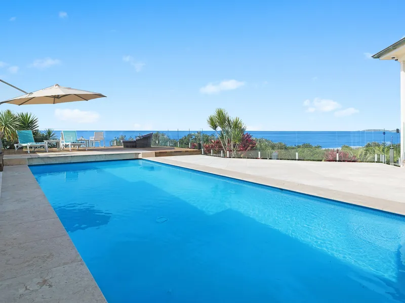 OCEANFRONT PARADISE A rare opportunity to own arguably the finest beachfront estate on the Coffs Coast