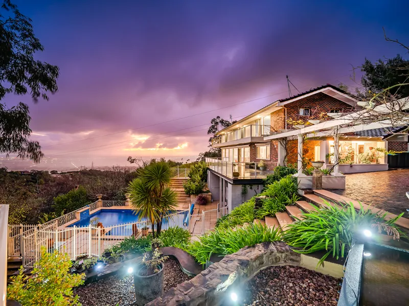 Beautiful Modern Contemporary Property Offers Rare Foothills Seclusion With Stunning Views Across 2.2 Hectares of Lush Private Land