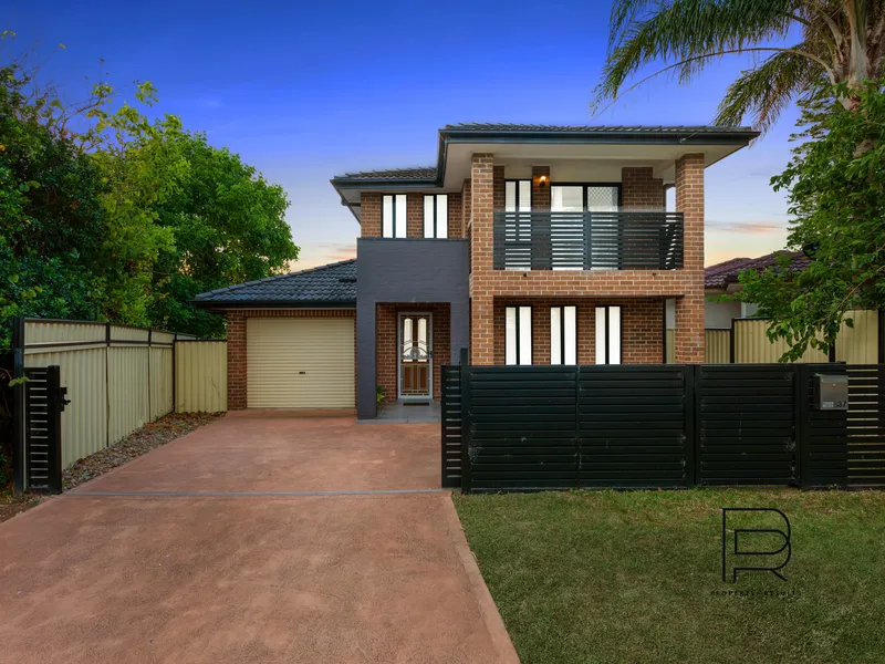 MODERN DOUBLE STORY BRICK VENEER FAMILY HOME!