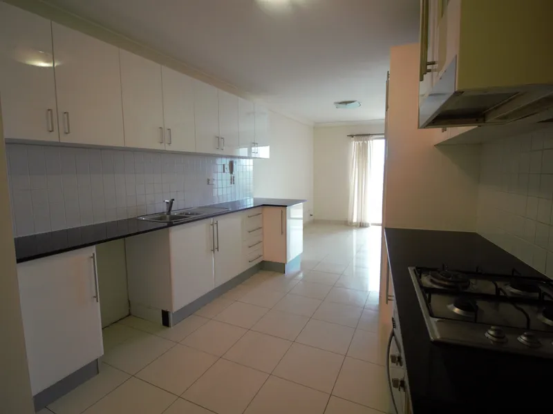 Conveniently located Split level three bedroom top floor apartment