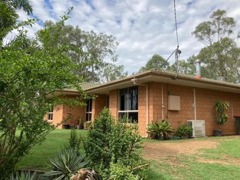 Neat Brick Home on Five Acres!