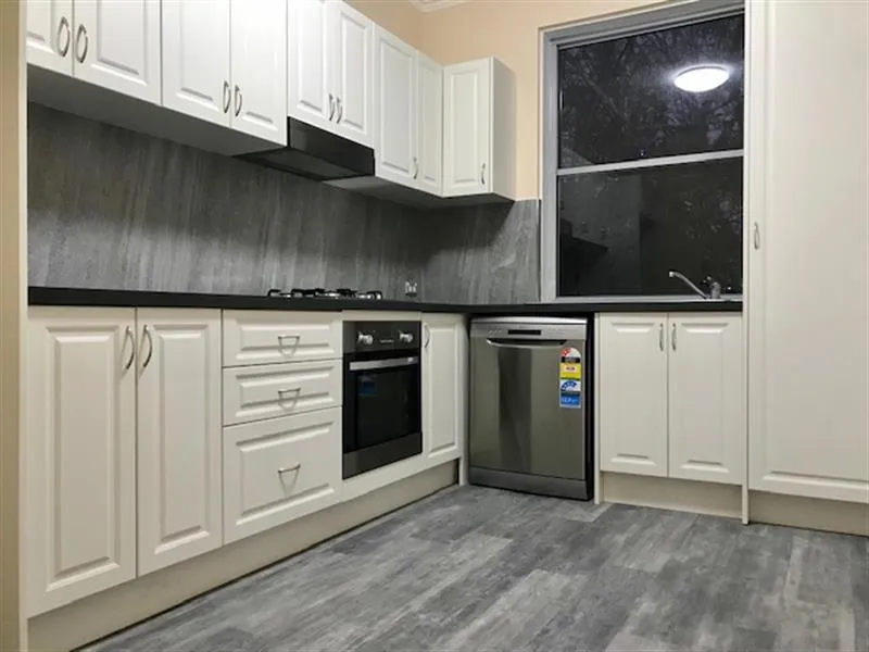 RENOVATED TWO BEDROOM GARDEN DUPLEX - ONE WEEKS FREE RENT