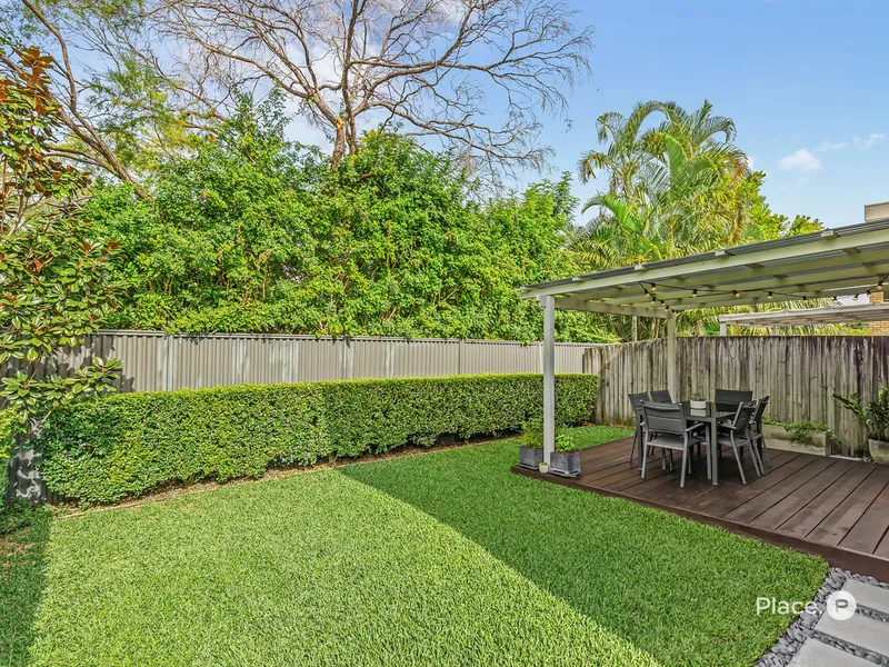 Sensational three-bedroom townhouse with private backyard