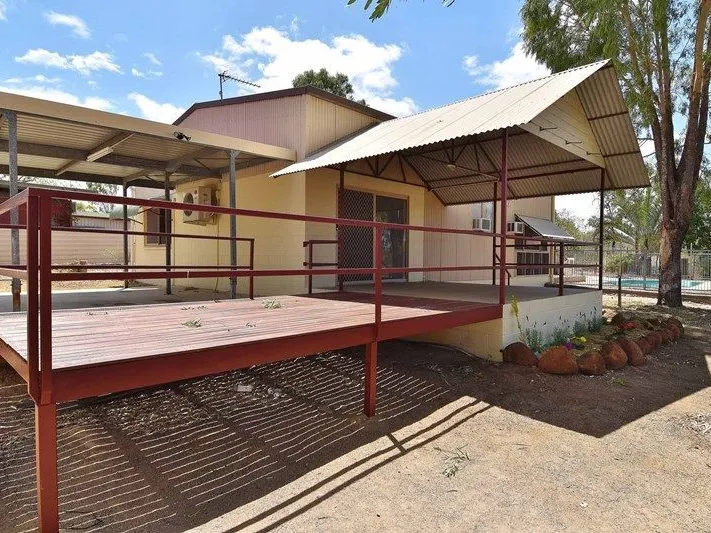 THREE BEDROOM HOME ON ACREAGE CLOSE TO TOWN WITH POOL. 