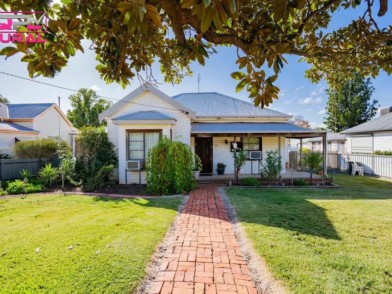 CHARACTER FILLED HOME IN A PERFECT LOCATION!