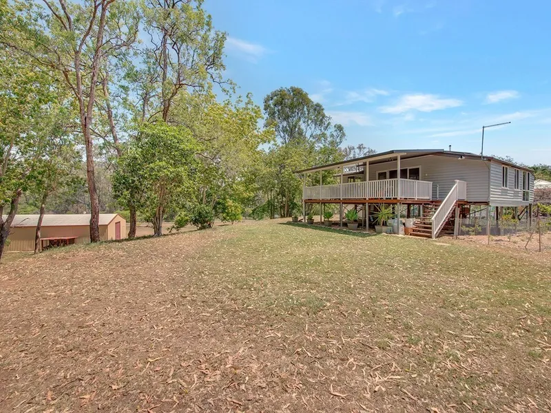 QUAINT HOME ON ATTRACTIVE ONE ACRE BLOCK