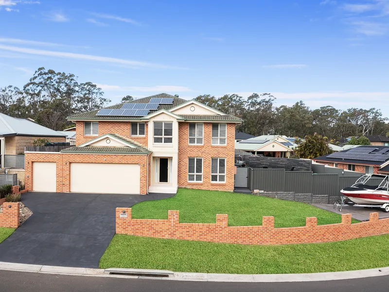 Indulge in this wonderful family entertainer nestled in a peaceful enclave