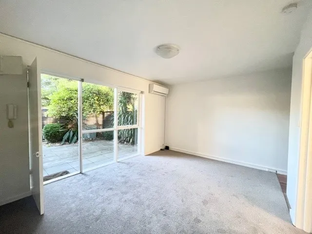 Large One Bedroom with Two Courtyards and Walk in Robe!