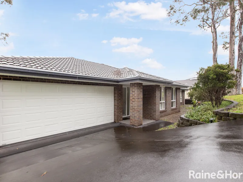 Stunning 4-Bedroom Brick & Tile Home in Central Coast's Premier Location